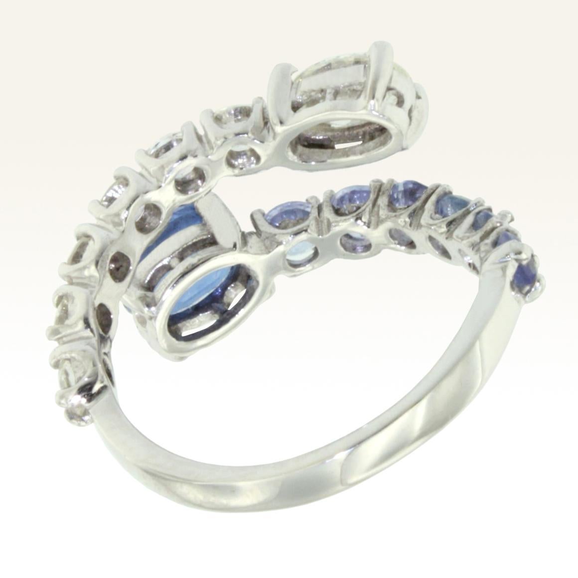 Oval Cut 18 Karat White Gold with Tanzanites and White Diamond Amazing Modern Ring For Sale