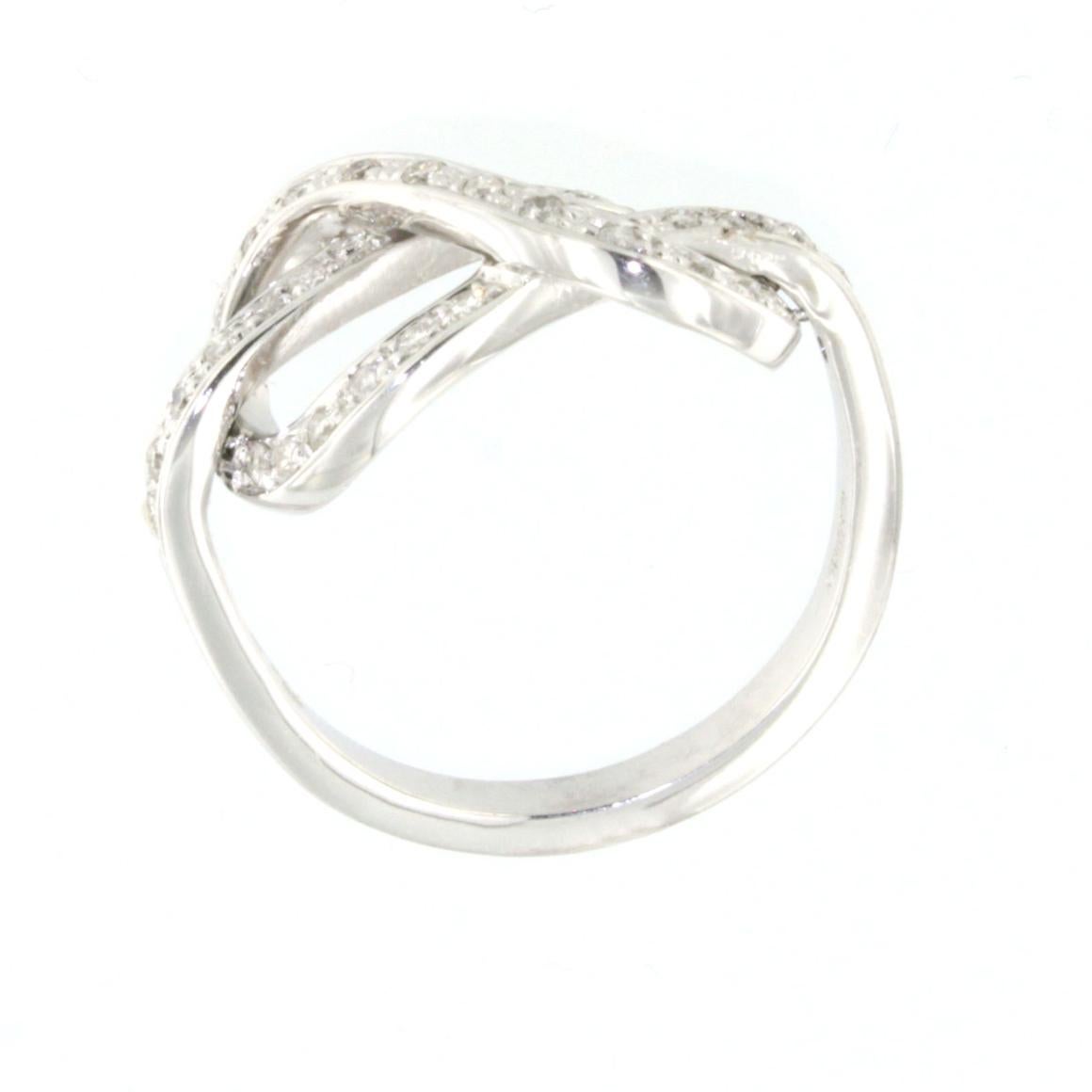 Modern 18 Karat White Gold with White Diamonds Ring For Sale