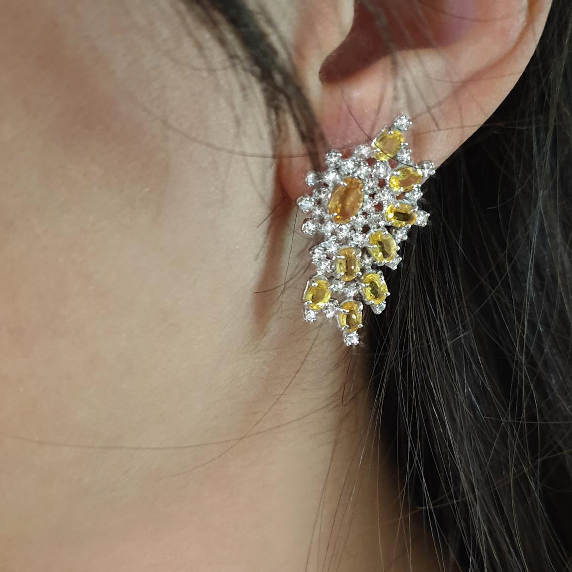 Contemporary  earrings made from Stanoppi Jewellery is part of a unique collection designed and inspired by Queen's Jewels, all handmade in Italy by expert goldsmith.
Designed and Handmade in Italy.
Earrings in 18kt white gold with yellow sapphire