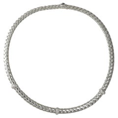 Collier en or blanc 18K à maillons tissés et diamants 0.50ct