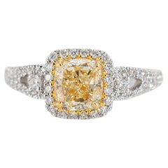 Verlobungsring aus 18 Karat Weißgold mit gelbem Diamanten im Kissenschliff und akzentuiertem Diamanten