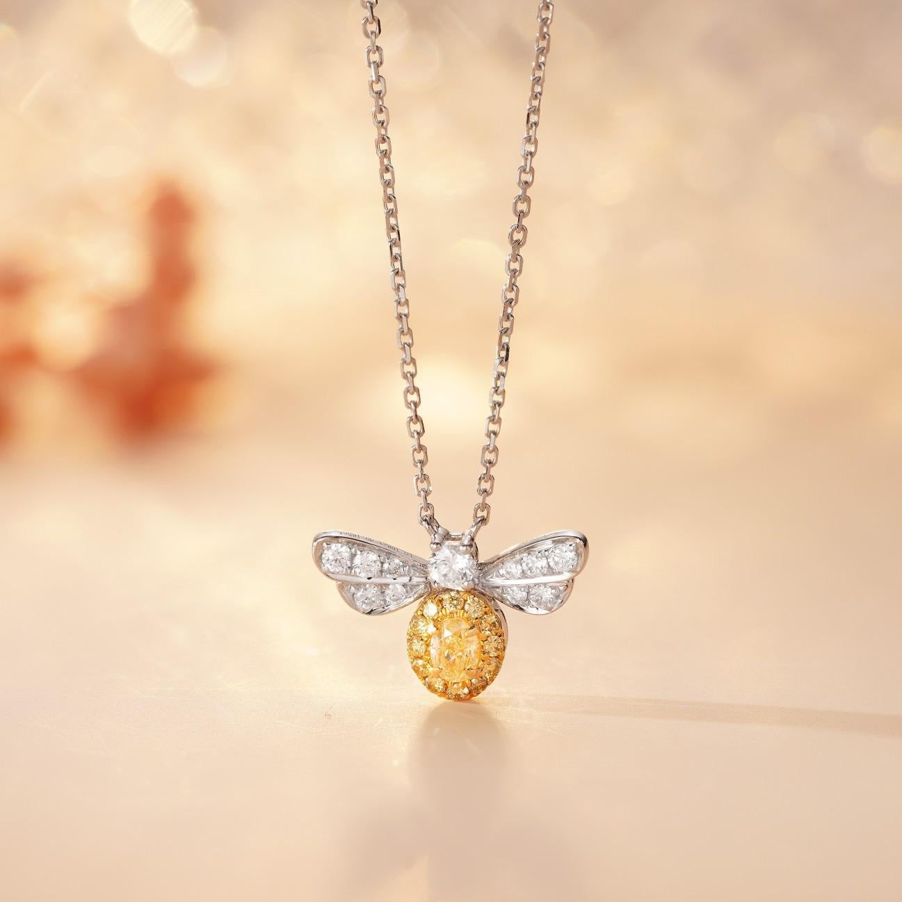 18K White Gold Yellow Diamond Bee Pendant Necklace

1 Yellow Diamond - 0.10 CT
Diamonds - 0.17 CT
Total Weight - 1.92 GM