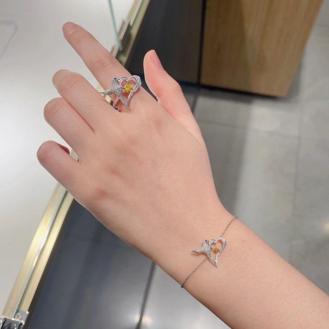 Round Cut 18K White Gold Yellow Diamond Bird Ring with Diamonds For Sale