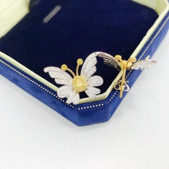 Orecchini con diamanti gialli in oro bianco 18 carati