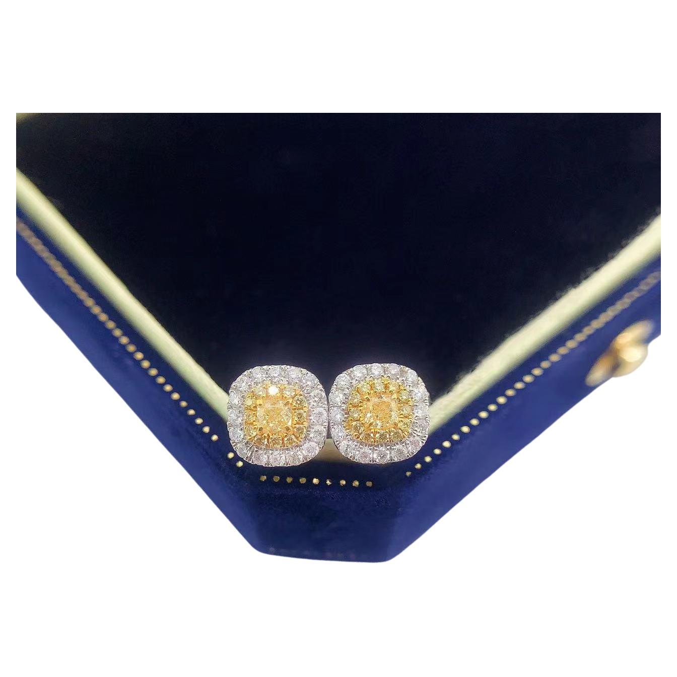 Orecchini con diamanti gialli in oro bianco 18 carati