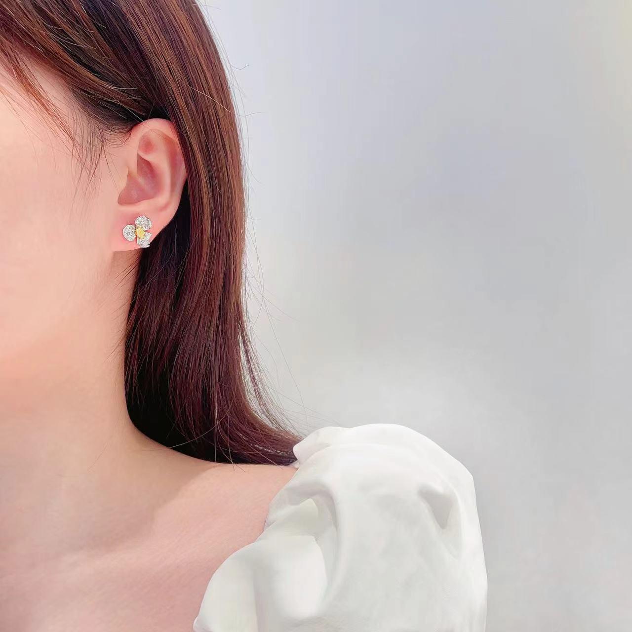 Oval Cut 18K White Gold Yellow Diamond Flower Earrings For Sale