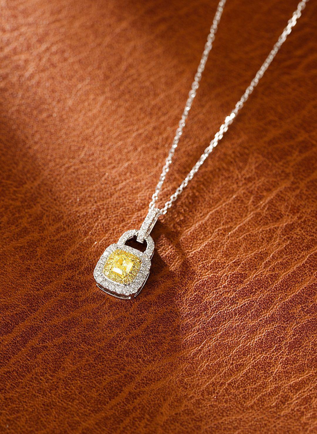 Modern 18K White Gold Yellow Diamond Lock Necklace For Sale