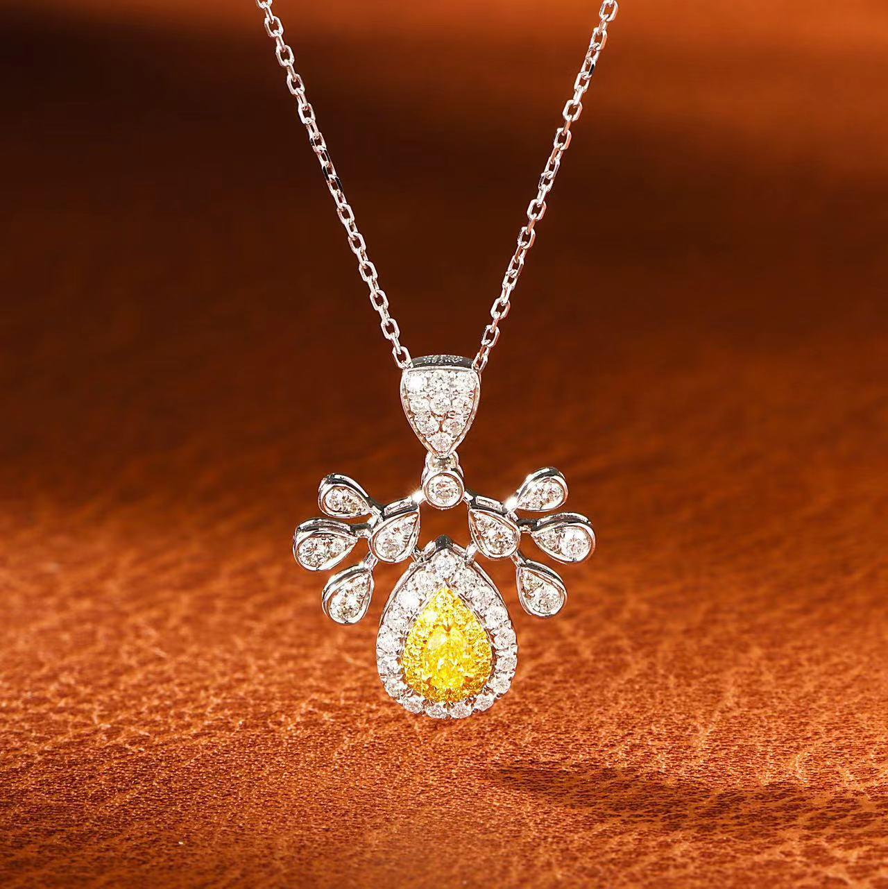 18K White Gold Yellow Necklace

18K White Gold - 2.91 GM
Yellow Diamonds - 0.12 CT
White Diamonds - 0.35 CT

Nurati Jewelry's captivating pendant is a stunning showcase of elegance and sophistication. Crafted in gleaming 18-karat white gold, it