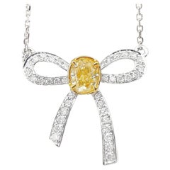 18K White Gold Yellow Diamond & Round Diamond Bow Pendant Necklace