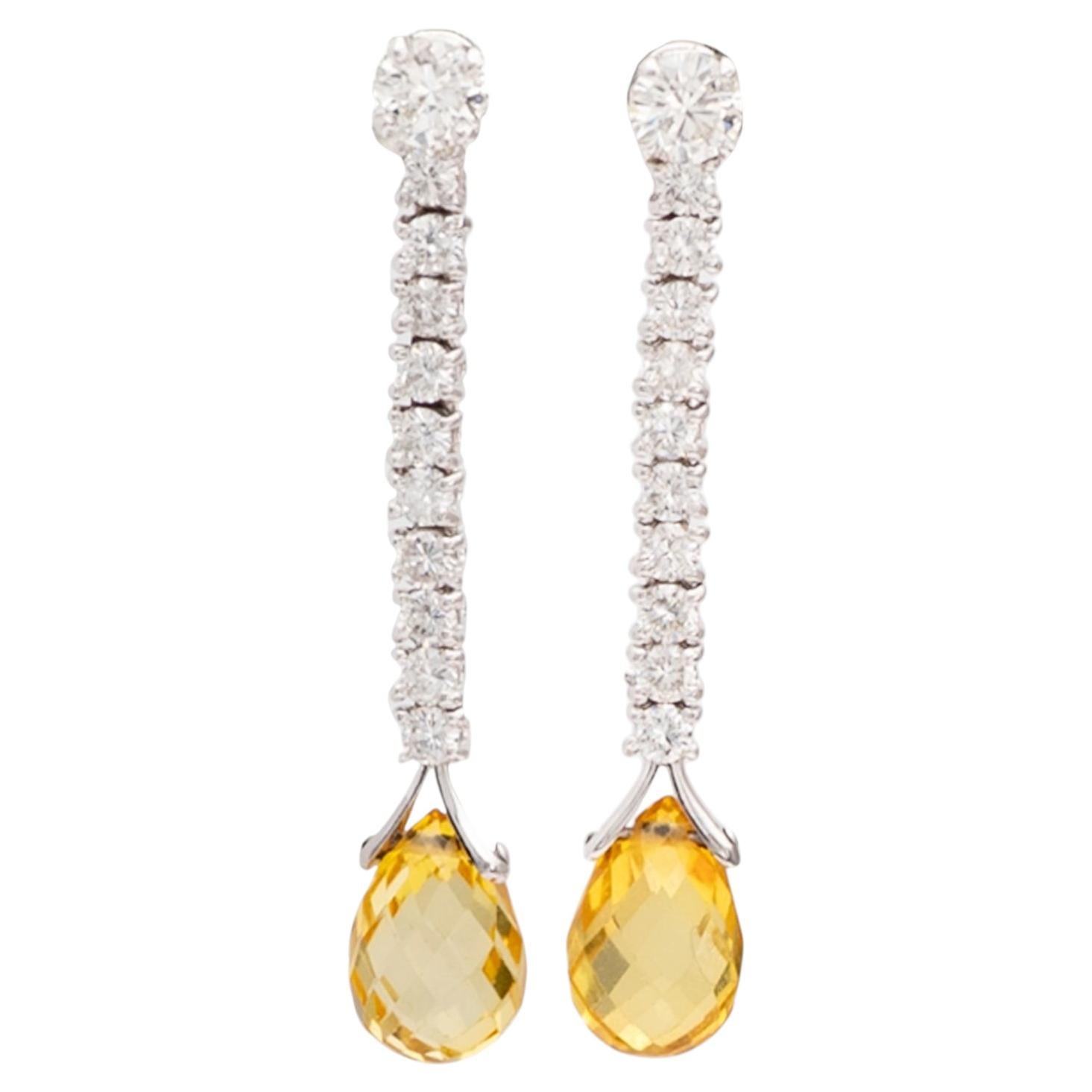 Pendientes colgantes de oro blanco de 18 quilates con zafiro amarillo y diamantes