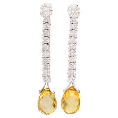 Boucles d'oreilles pendantes en or blanc 18 carats, avec saphir jaune et diamants