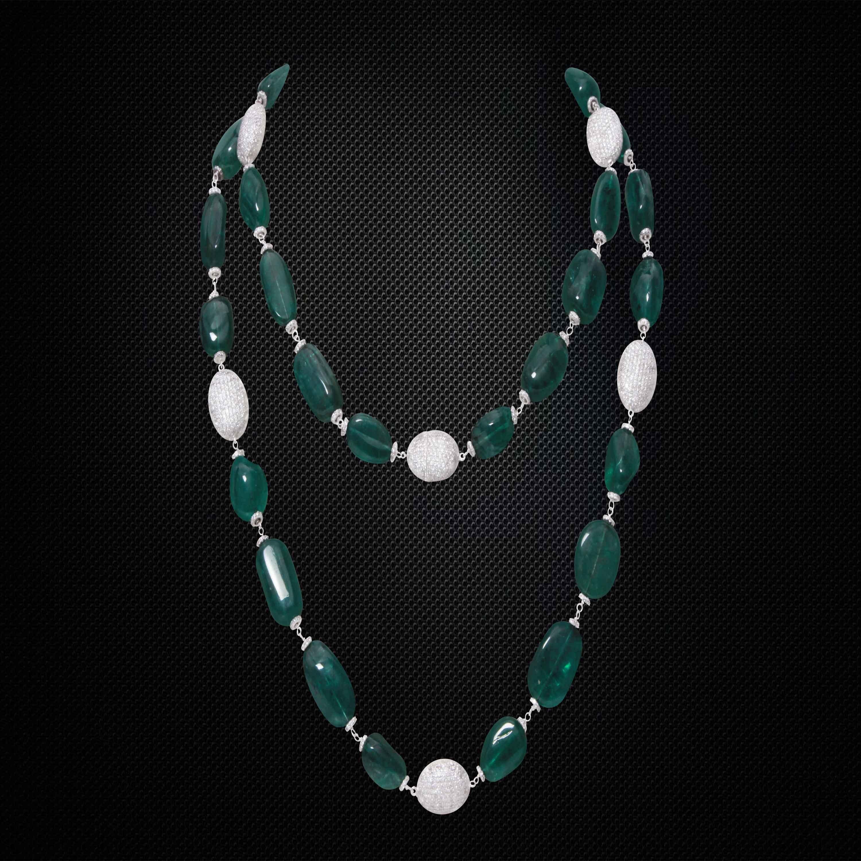 A single strand Zambian Emerald Necklace, which consist of 32 pieces which weigh 452.38 carats and includes 21.91 carats Round White Diamonds.
This necklace is made in 18K White Gold and weighs approximately 45.822 grams.
The clasp is also made of