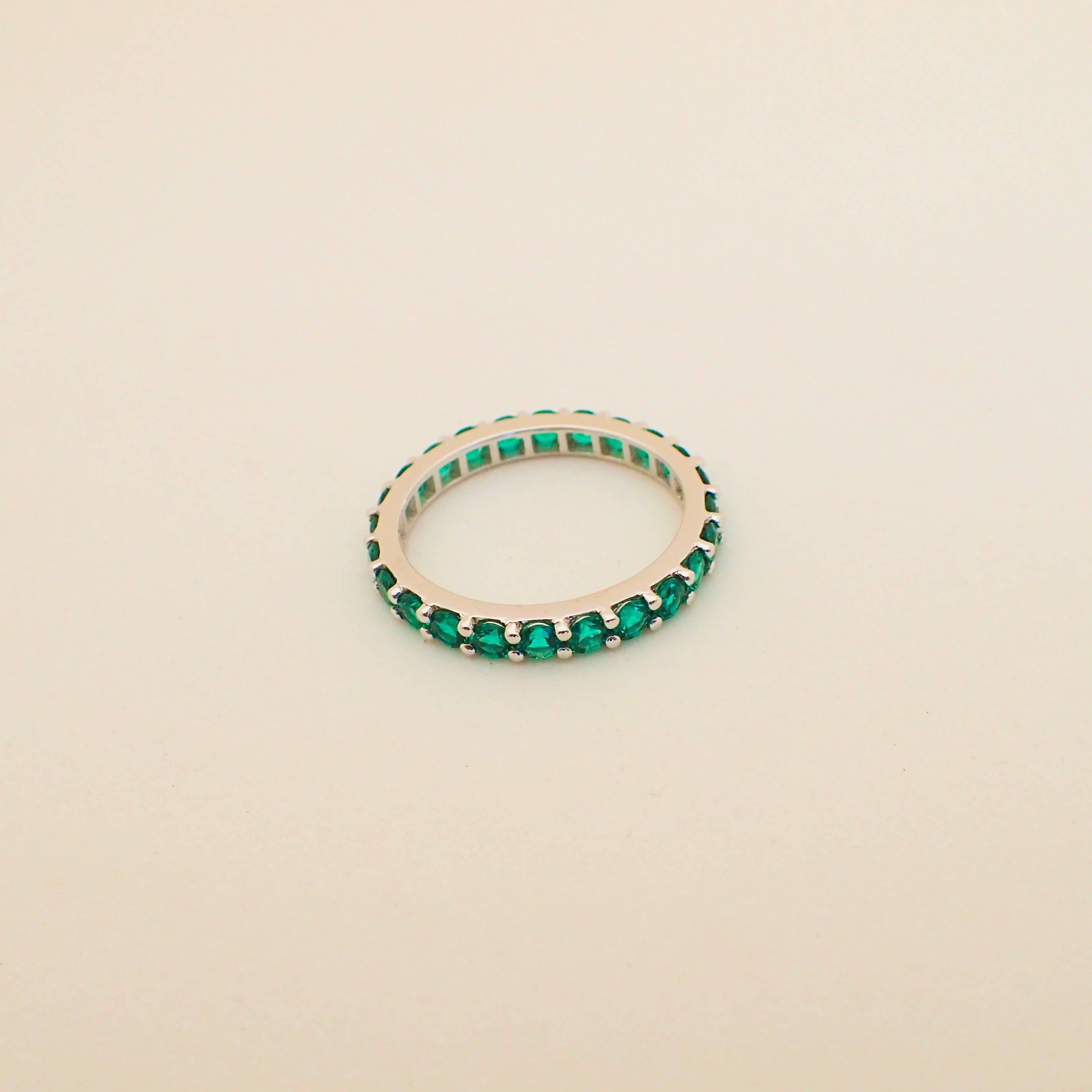 18 Karat Gold Eternity Band with Chatham-Created Emeralds Weighing 1.22 Carat 1
