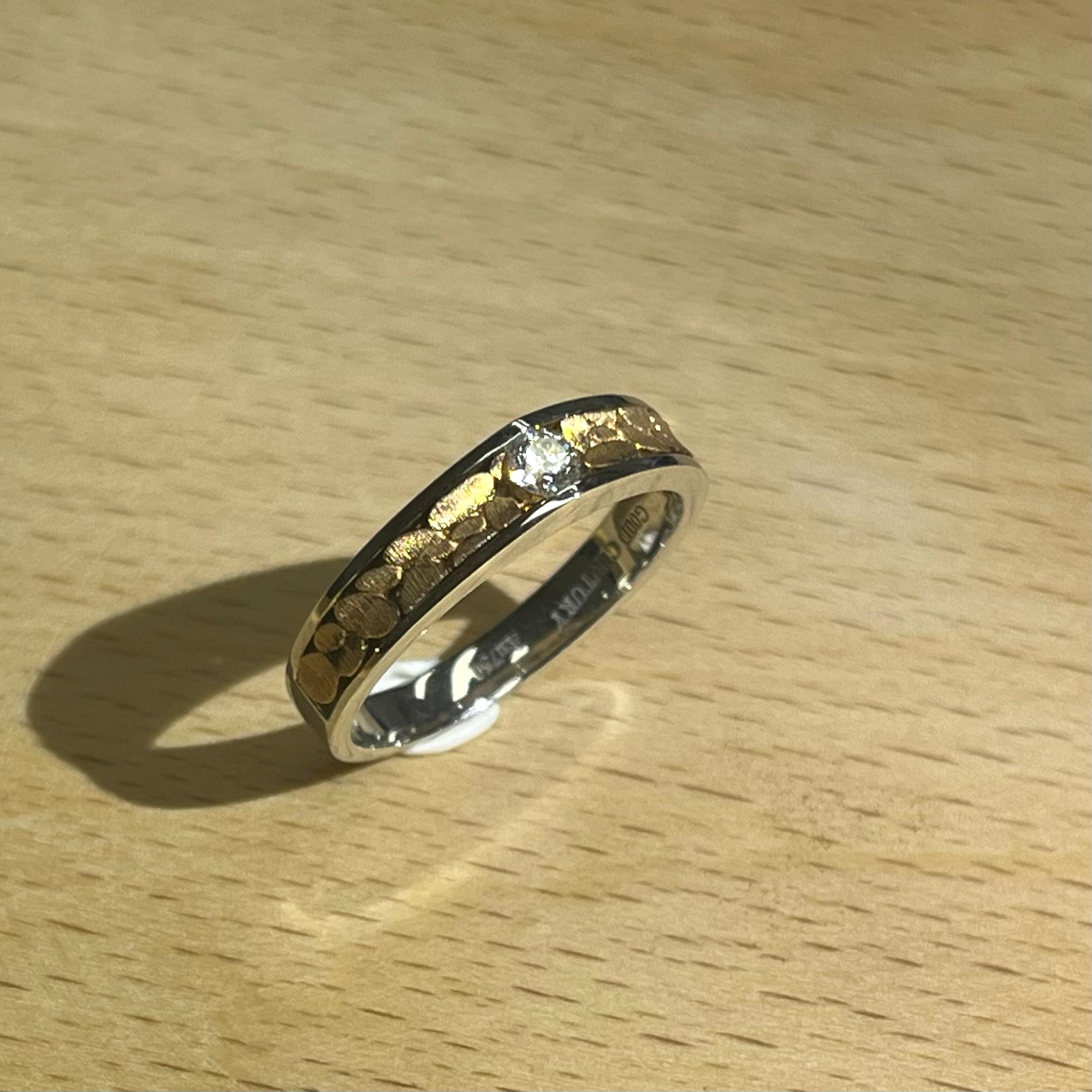 18K White & Rose Gold Single Natural Diamond Ring

1 Diamond - 0.144 CT
18K Gold - 4.74 GM