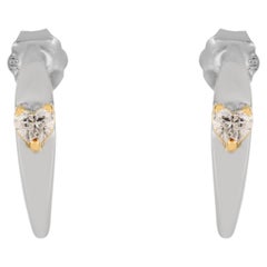 Boucles d'oreilles contemporaines en or blanc et jaune 18K avec diamant en forme de coeur