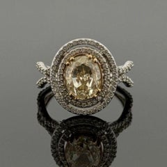18K Weiß & Gelbgold Fancy Light Yellow Diamond Ring 2,51ct Oval 0,78ctw Halo