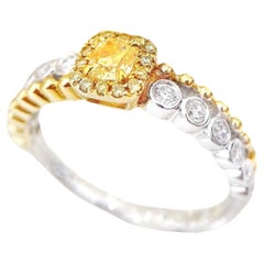 Anillo con Diamantes en Oro Amarillo y Blanco de 18 K