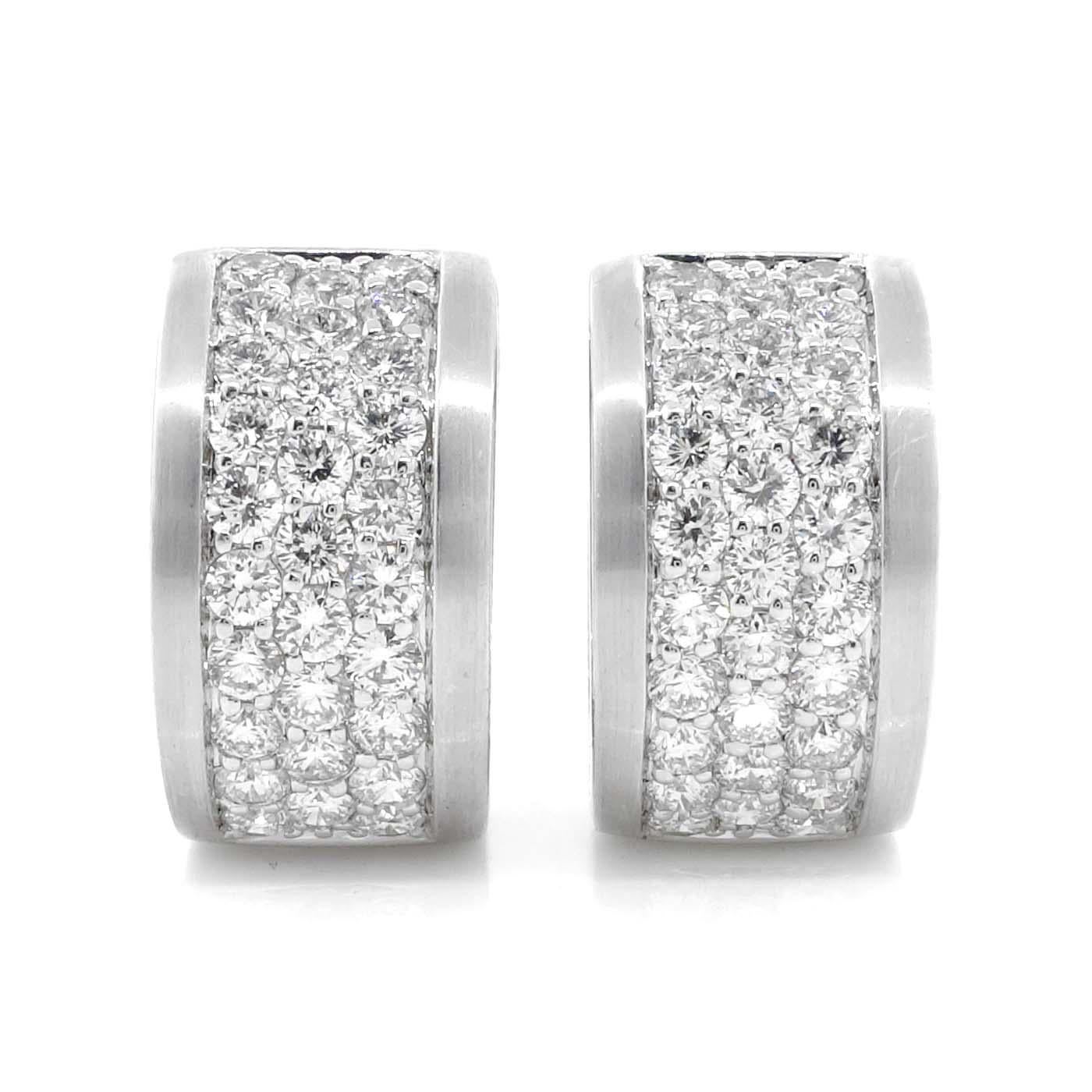 Hoop diamond earrings containing 58 round brilliant cut diamonds of about 1.70 carats with a clarity of VS and color G. All diamonds are set in 18k white gold earrings. The total weight of the earrings is approximately 11.92 grams.