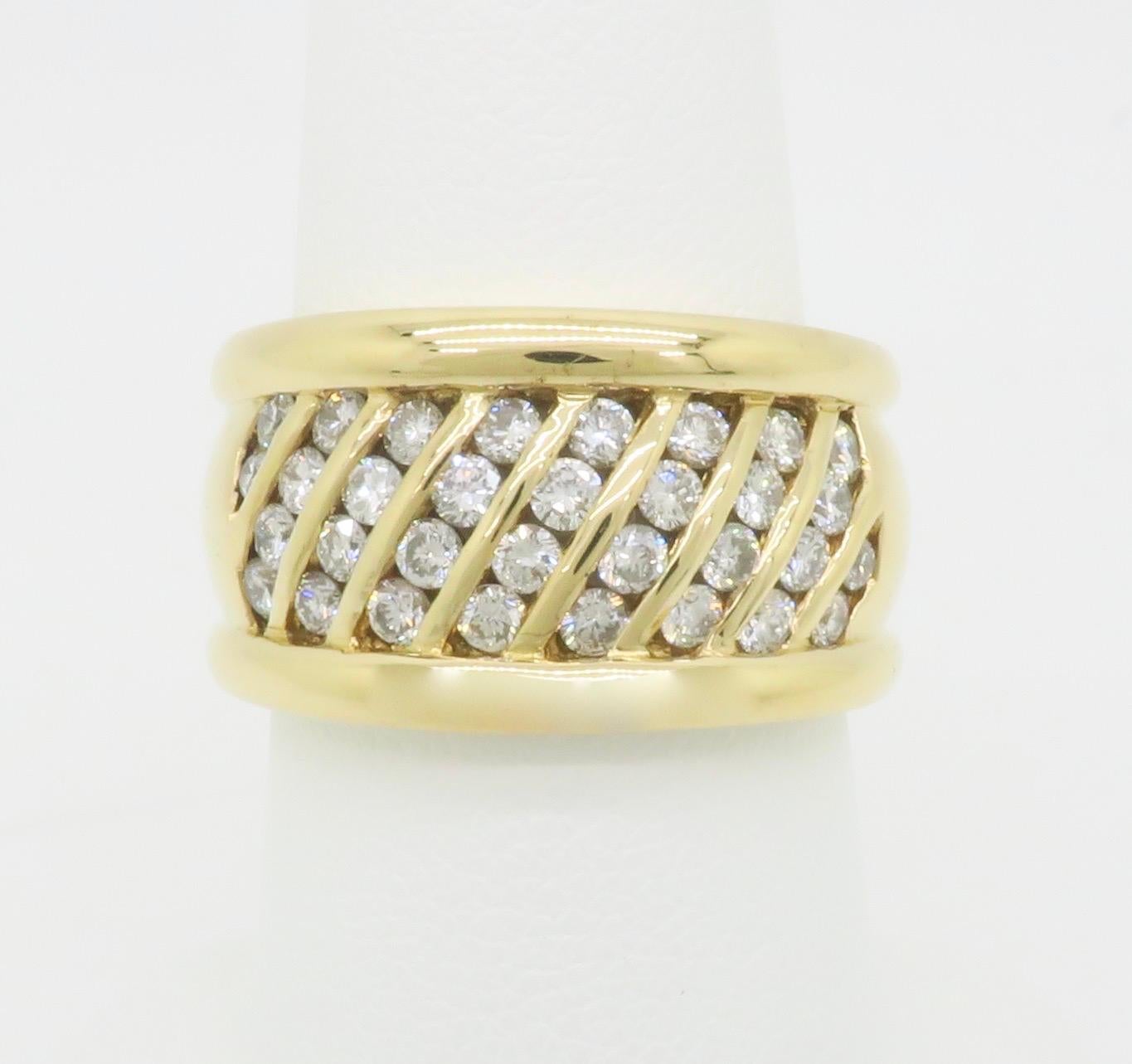 Wide diamond cocktail ring made with 1.12CTW of diamonds in 18k yellow gold. 

Gemstone: Earth Mined Diamond
Diamond Carat Weight: 1.12ctw
Diamond Cut: Round Brilliant Cut
Color: F-H
Clarity: VS-SI
Metal: 18K Yellow Gold 
Stamped: 