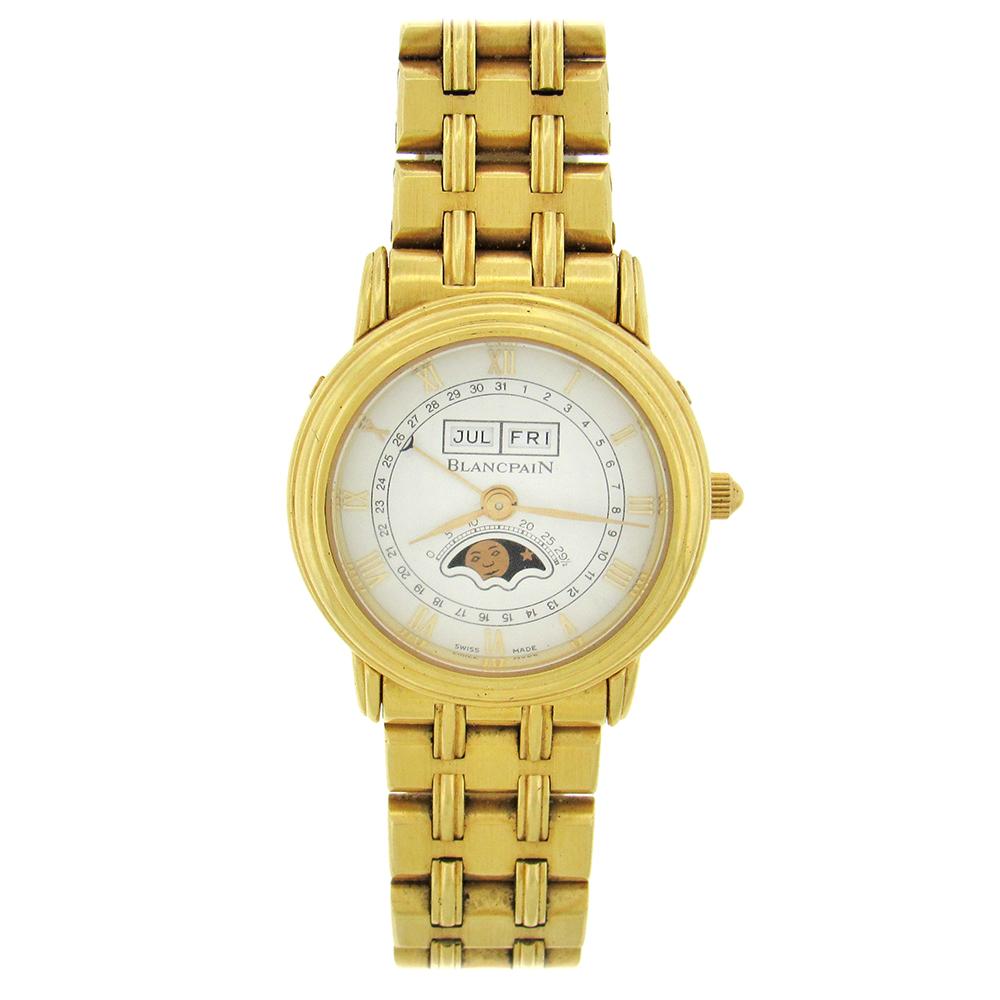 18K yellow gold Blancpain, circa 1990's, is a fine astronomic, 18K yellow gold women's wristwatch with triple date, lunar calendar and moon phases, with 18K yellow gold integrated bracelet.  The 26mm round case has a triple stepped bezel.  The white