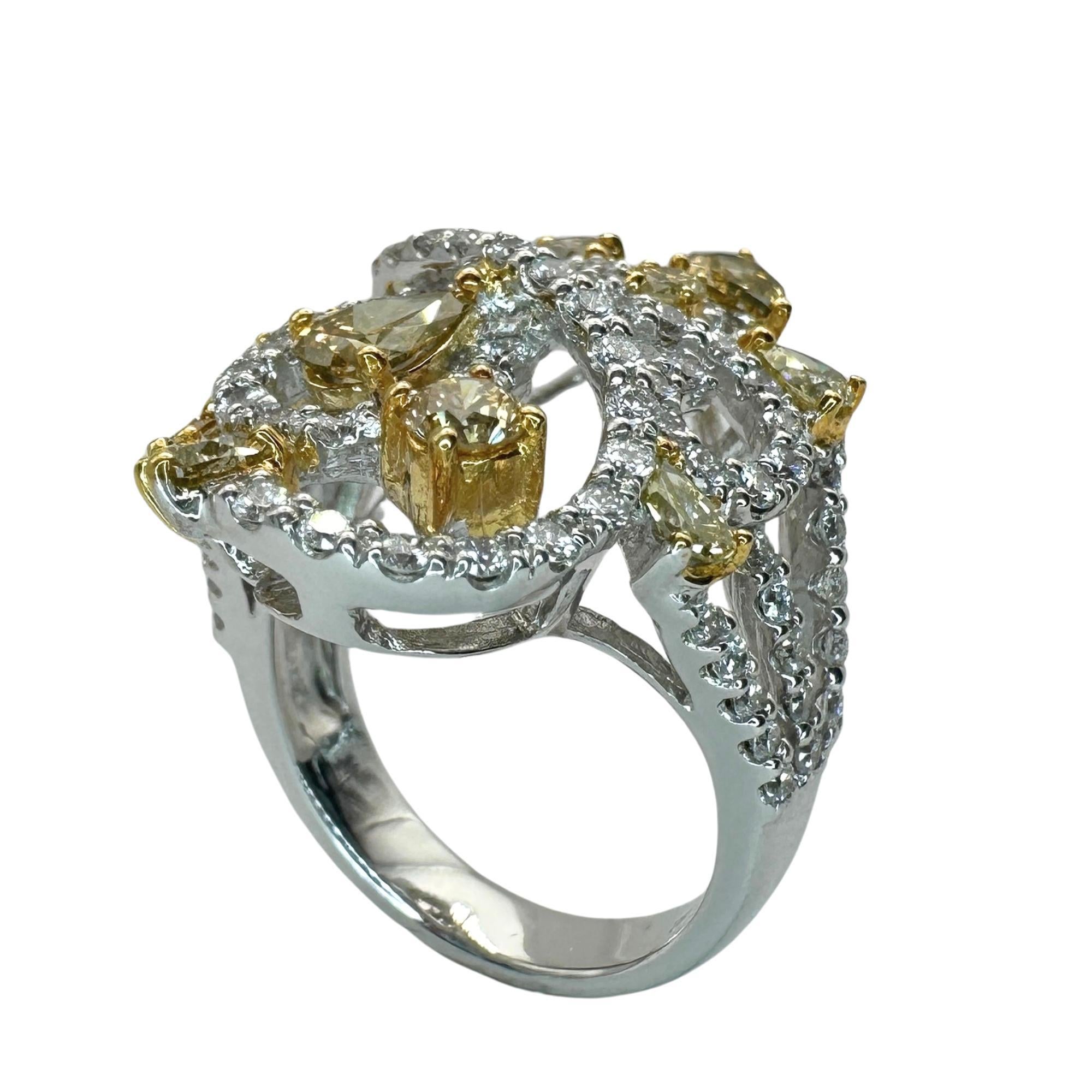 Elevate your style with our 18k Yellow and White Diamond Ring. Weighing 7.2 grams and sized at 6.5, it features stunning 1.76 carats of yellow diamonds and gracefully complemented by 1.45 carats of white diamonds. A timeless blend of sophistication