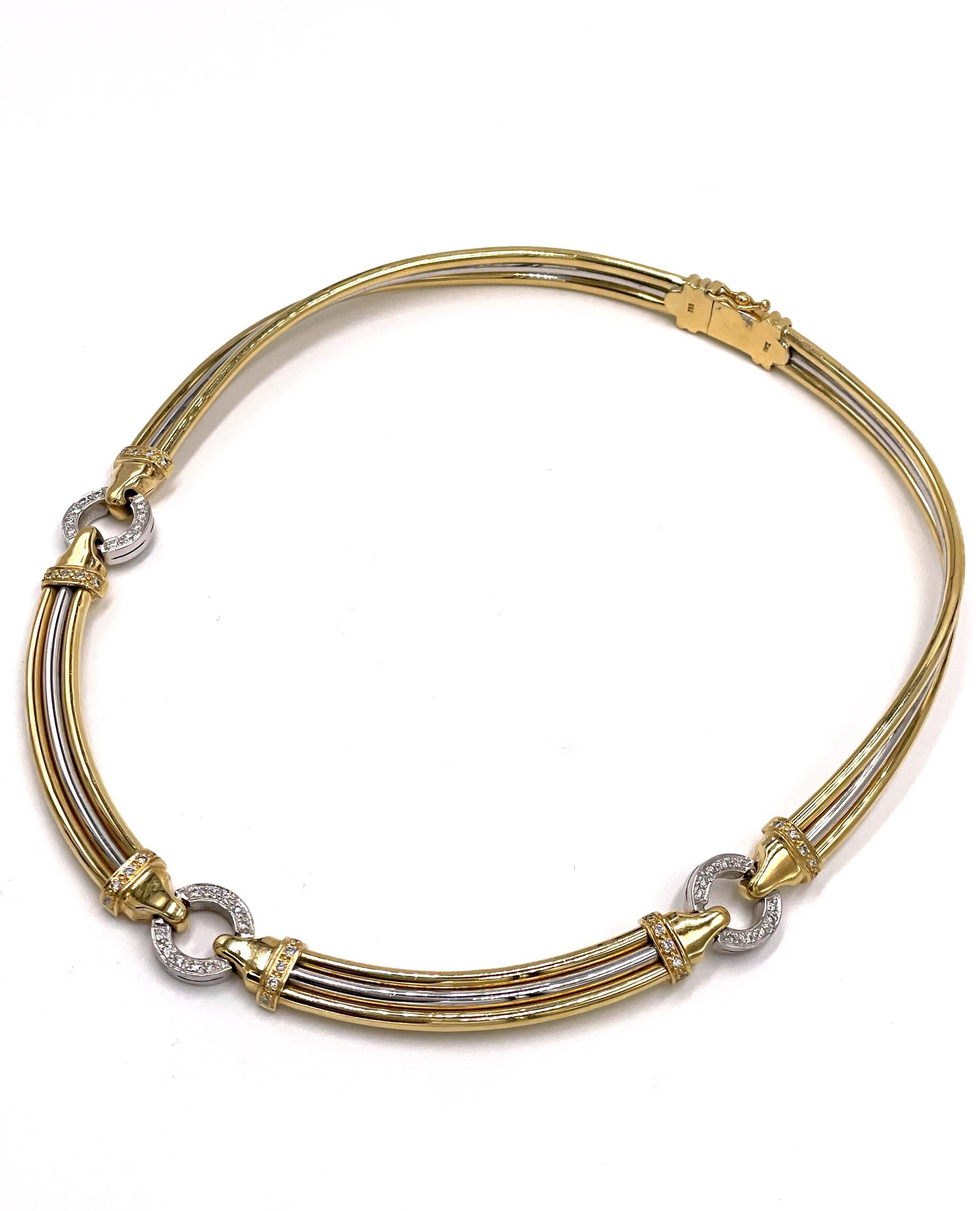 halskette aus 18 Karat Gelb- und Weißgold mit Diamanten.  Das Collier besteht aus drei runden Kreisen, die mit runden Brillanten in Pflasterfassung besetzt sind.  Die Halskette hat ein Gesamtgewicht von 1,20 Karat.

* 17 Zoll lang
* Diamanten sind G