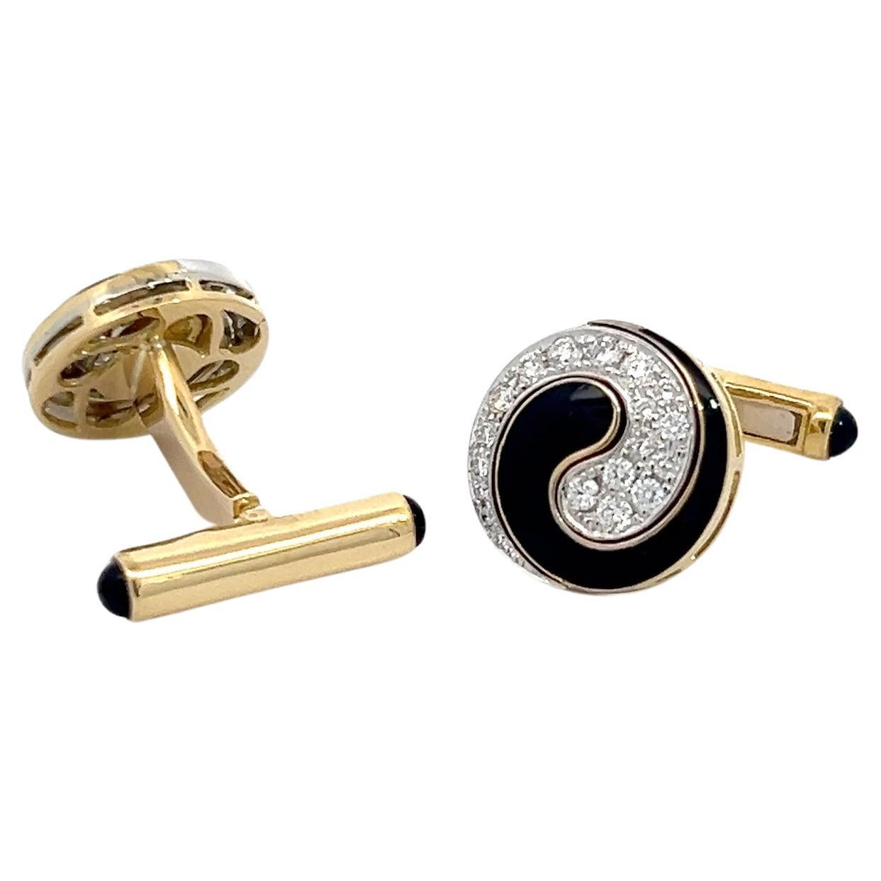 Gemelli in oro giallo e bianco 18k con diamanti bianchi, smalto nero e onice nera