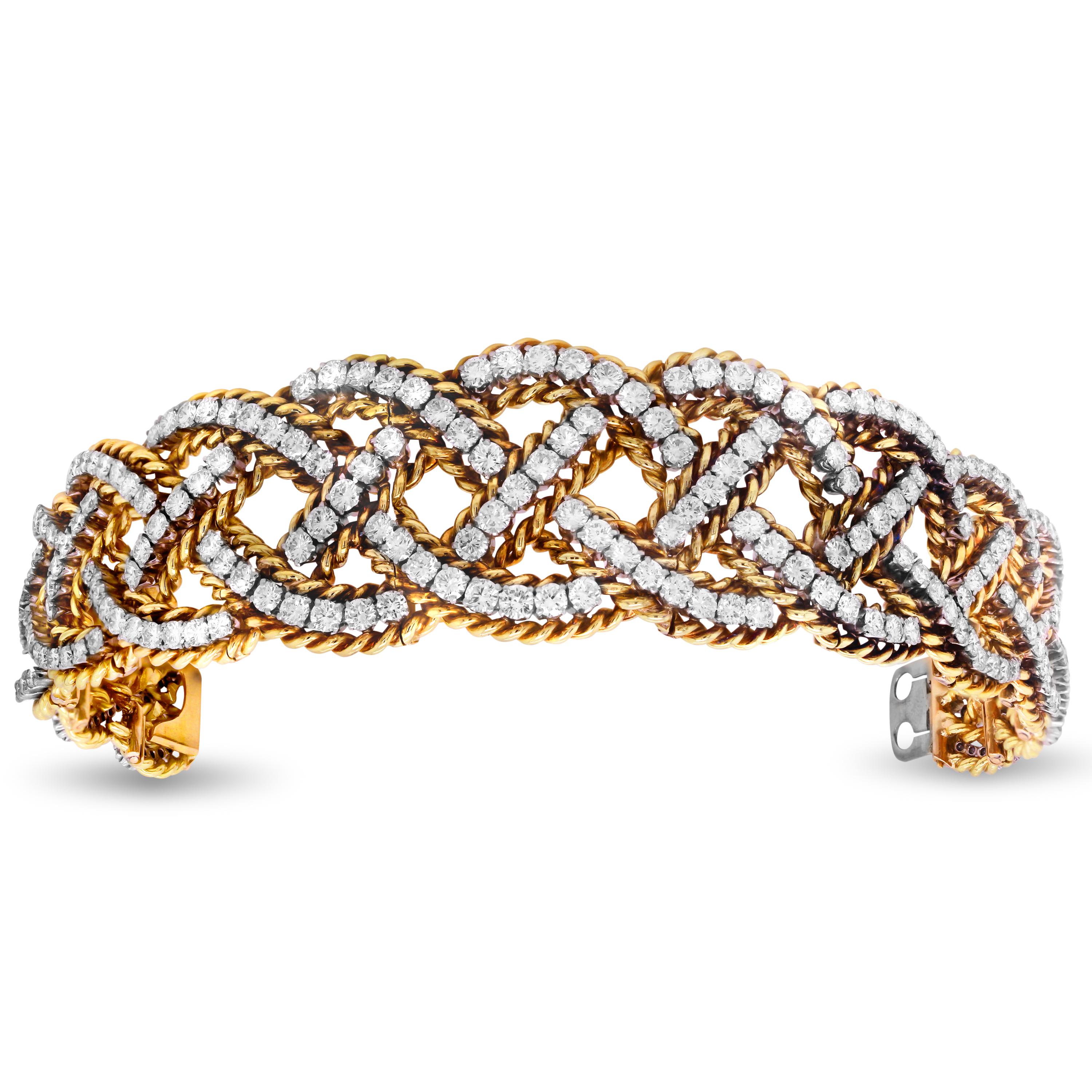 18K Yellow and White Two Tone Gold Diamond Graduated Links Twist Style Retro Bracelet

This unique and elegant bracelet features a twisted, intertwined design with diamonds all around. A state of the art piece that does not open straight out.