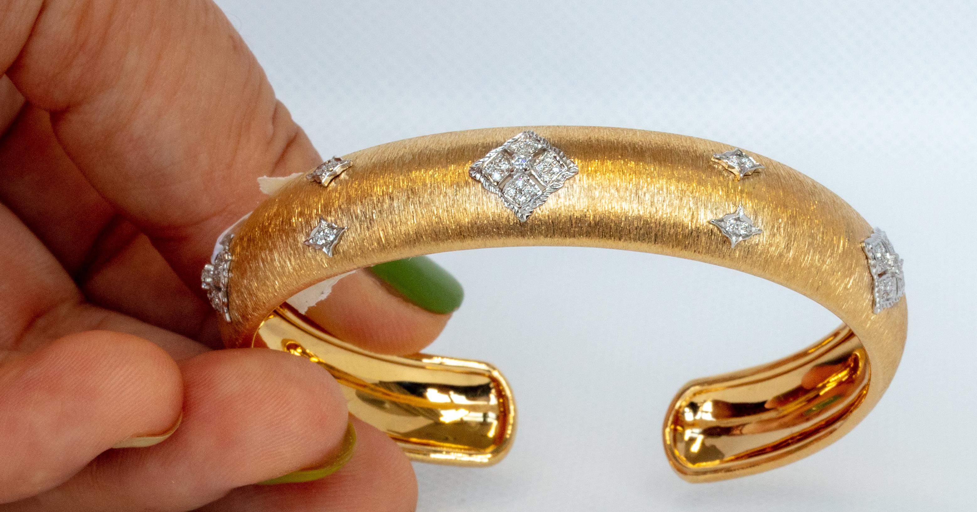 18K YELLOW AND WHITE GOLD DIAMONDS BANGLE in Florentine Finish 
59 ROUND DIAMONDS - 0.24cts
18 KWY - 14.25gm
Size 48x58 MM

This item is currently in making. The lead time is 4-8 weeks. Please let us know your wrist size so we can do it custom made.