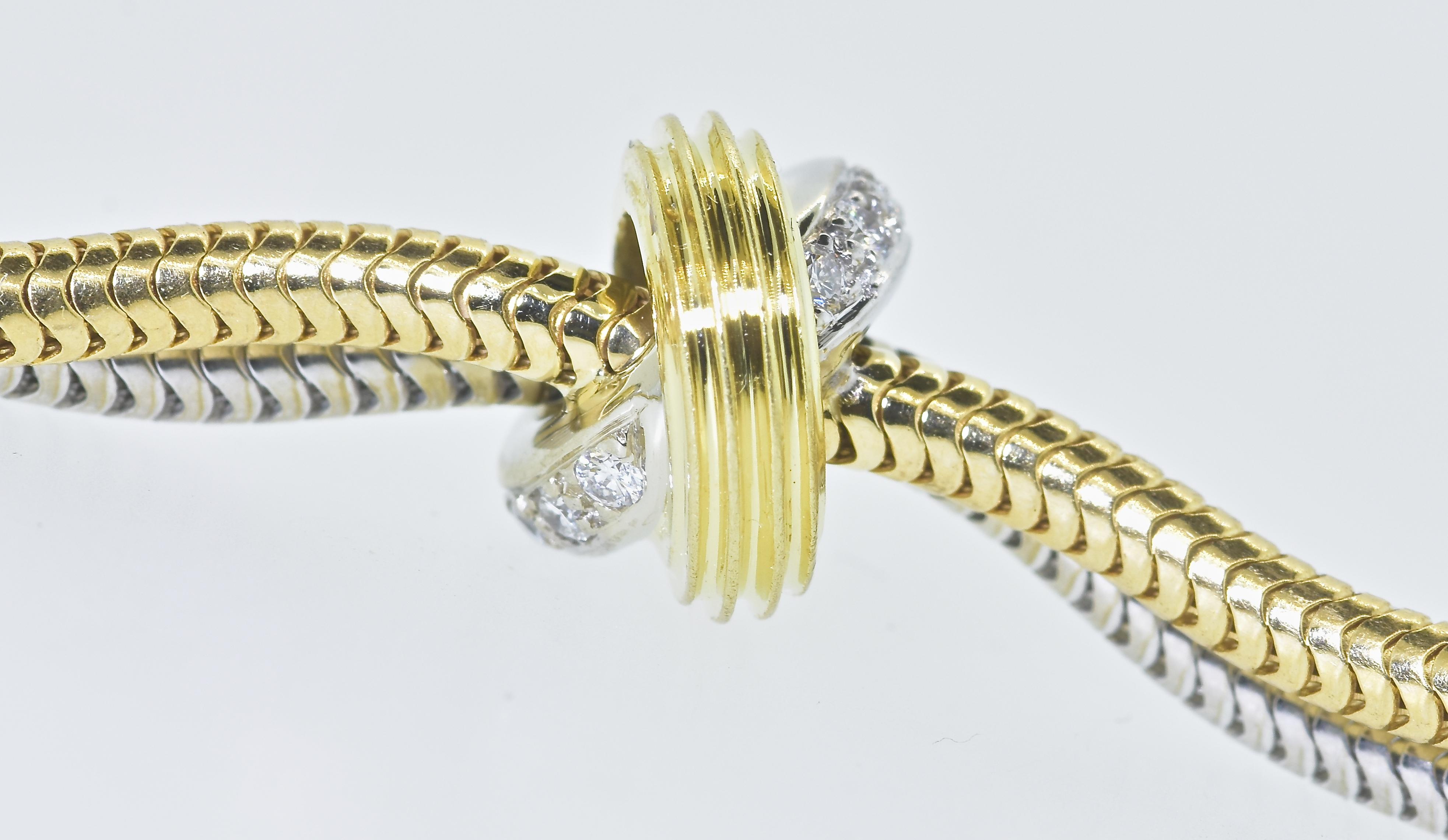 Contemporary 18 Karat Yellow and White Gold Love Knot Bracelet with Diamonds