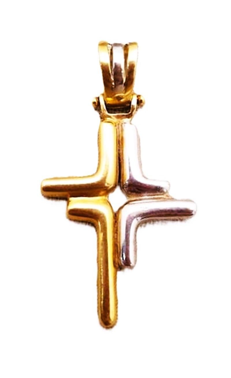 This is by far one of the desirable Cross pendants I have seen yet.    I love the design.  It's very Modern.   It is such a quality made piece.  The cross is 18k Two-Tone White and Yellow Gold.  It's nice and heavy.  I paired it up with a 14k Yellow