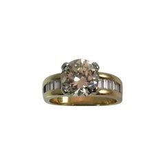 18K Yellow and White Gold Ring Set with 2.11ct  Round Diamond and Baguettes