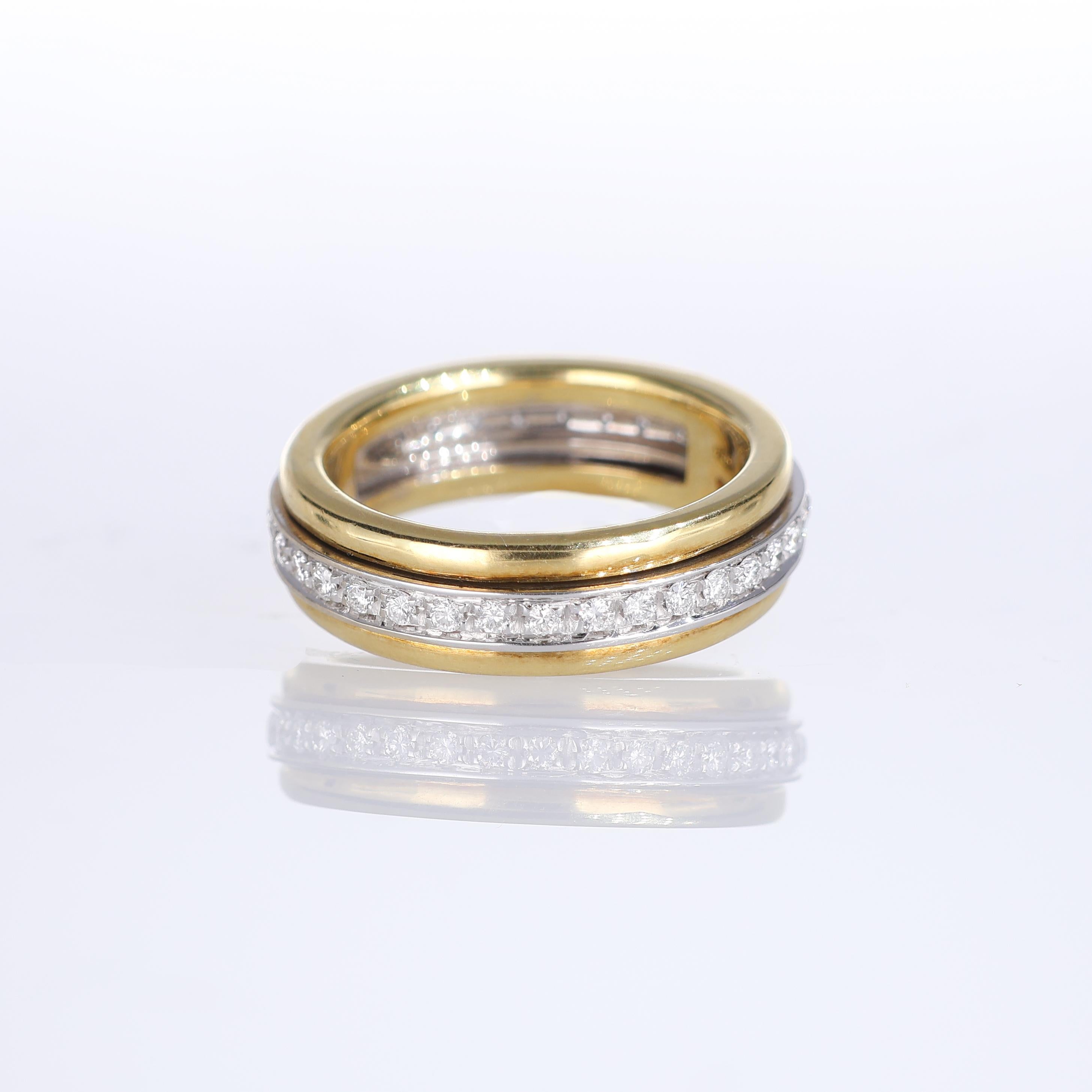 Brilliant Cut 18K Yellow and White Gold Rotating Diamond Band For Sale