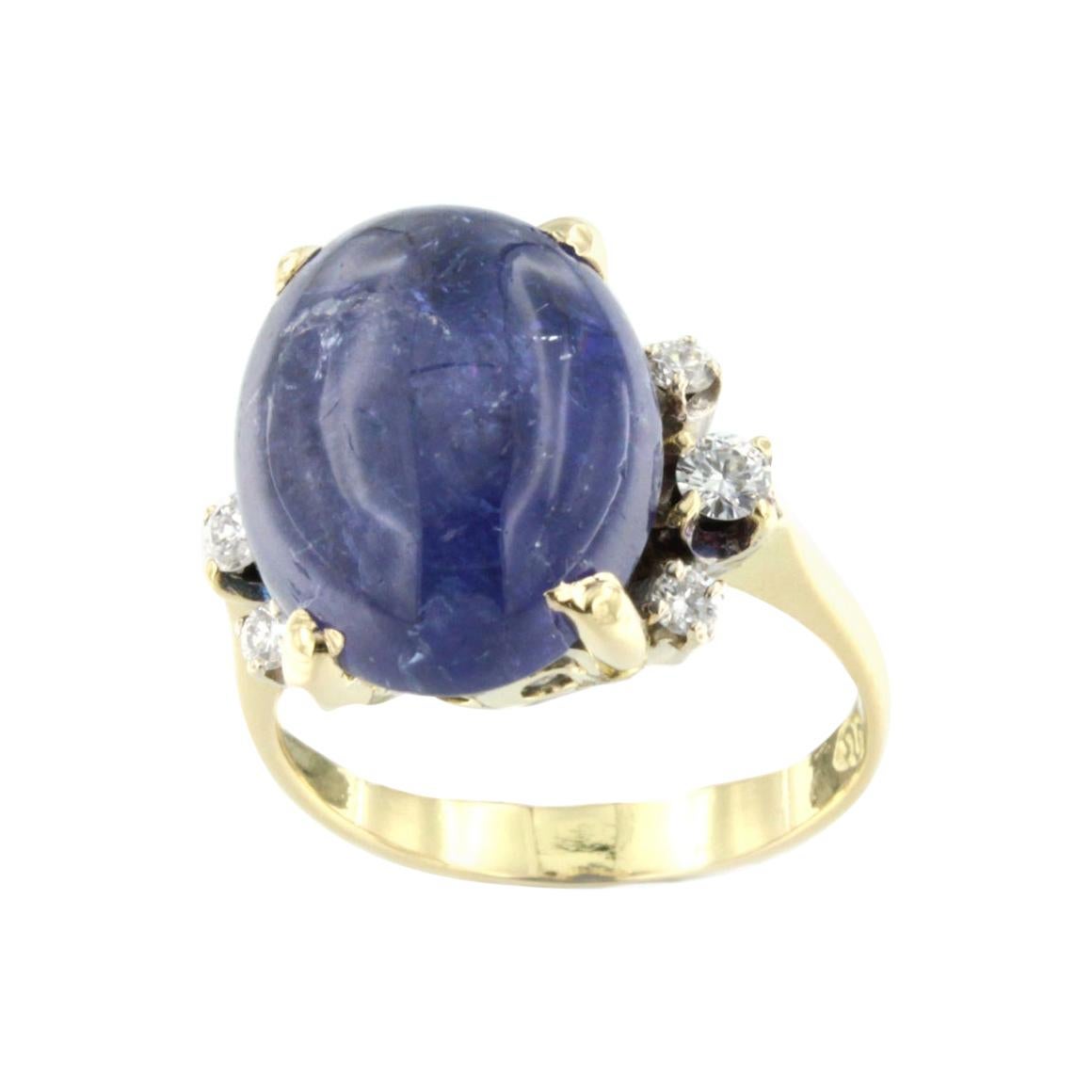 Bague en or jaune et blanc 18 carats avec tanzanite et diamants blancs en vente