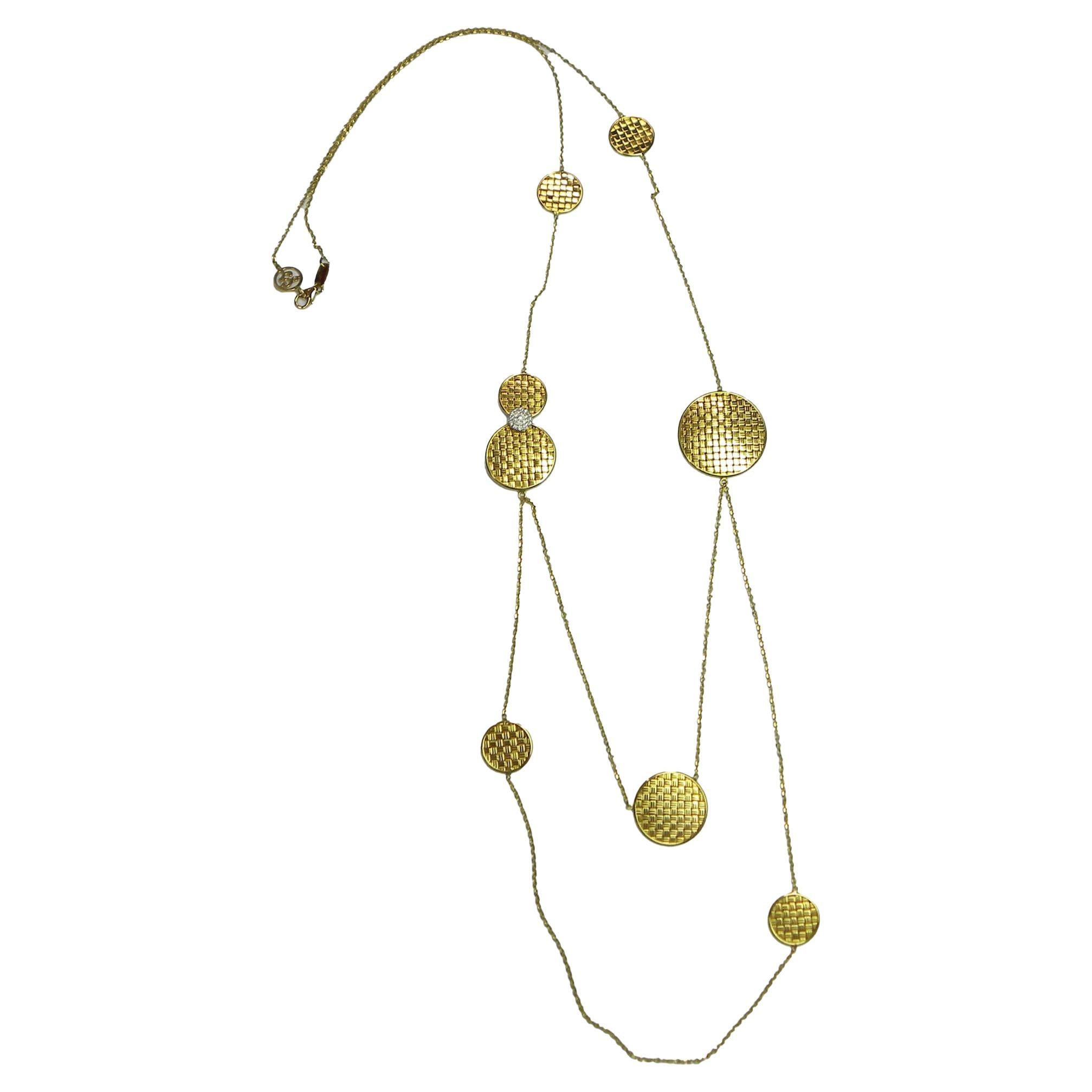 Collar Estación Tejido de Oro Amarillo y Blanco de 18k con un Diamante