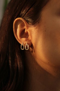 18 Karat Yellow Gold, 0.05 Carat Diamond Hexagon Earring