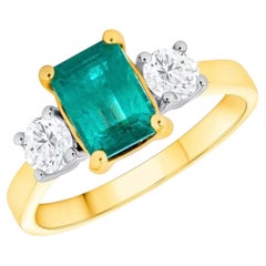 Oro giallo 18 carati 0,40 carati di diamanti e 1,16 carati di smeraldi dello Zambia  Anello