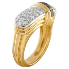 Anillo de oro amarillo de 18 quilates con diamante y zafiro de 0,50 ct MF29-050626