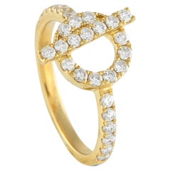 Bague en or jaune 18K avec diamant de 0,55ct