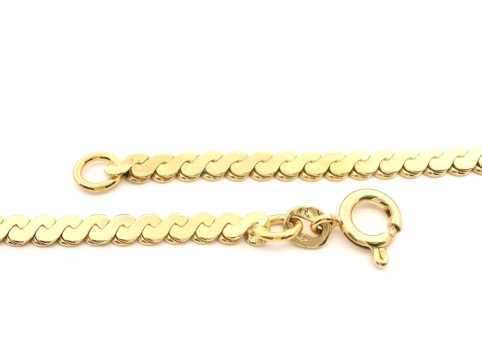 –Stone(s)–
(9) Natural Genuine Diamond - Round Brilliant Cut - Prong Set - Brilliant White Diamonds - 0.56ctw (approx.)

Material: Solid 18k Yellow Gold
Weight: 21.48 Grams
Chain Type: 17” - 3.55mm Flat 