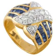Bague en or jaune 18 carats, sertie d'un diamant de 0,61 carat et de saphirs – MF40-062526