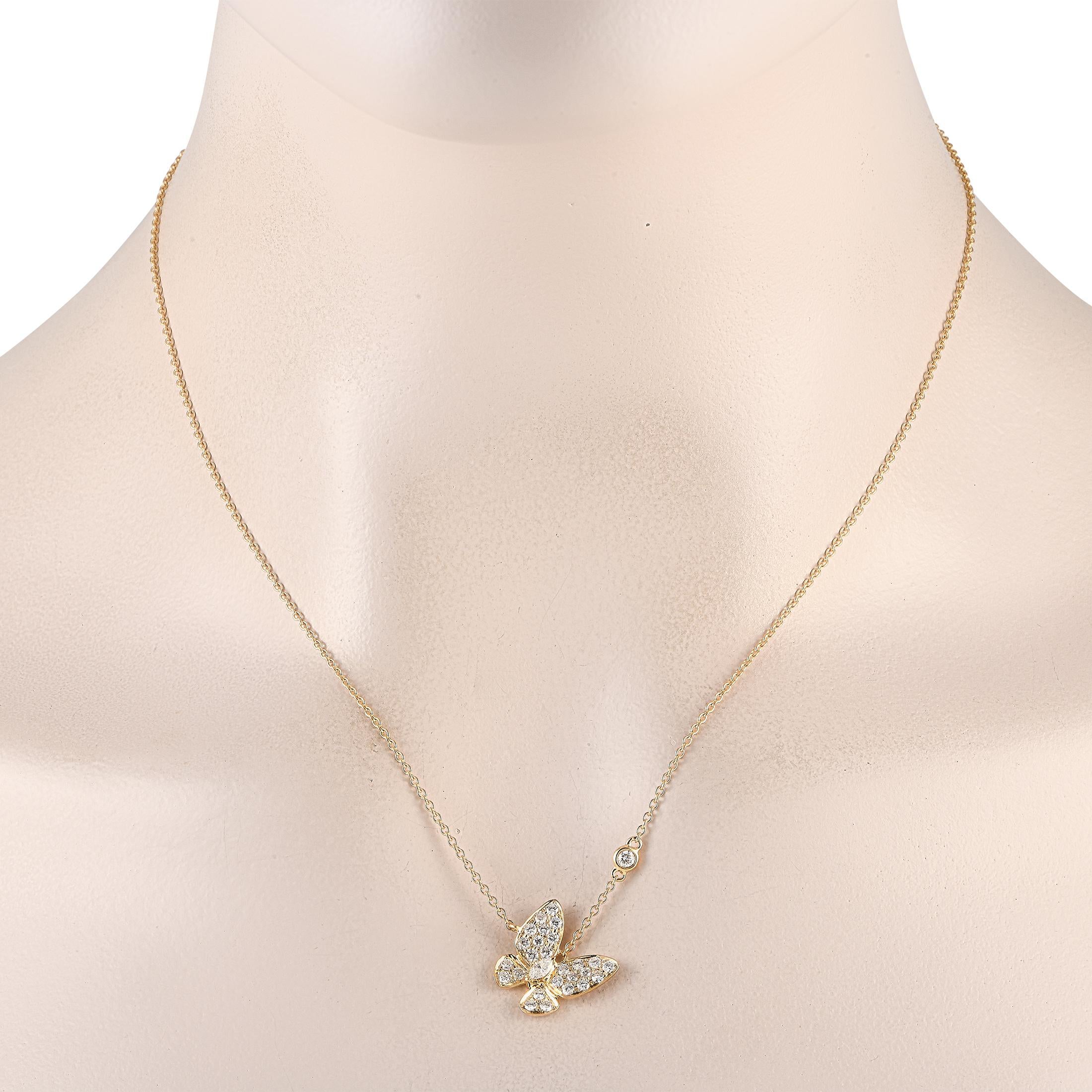 This exquisite necklace possesses a surprising sense of movement. At the center of a delicate 18 chain, an 18K yellow gold butterfly pendant measuring 0.75 round is perfectly paired with a single bezel-set diamond. This piece comes complete with a