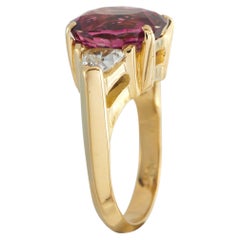 Bague en or jaune 18K avec diamant et spinelle de 0,80ct MF15-051326