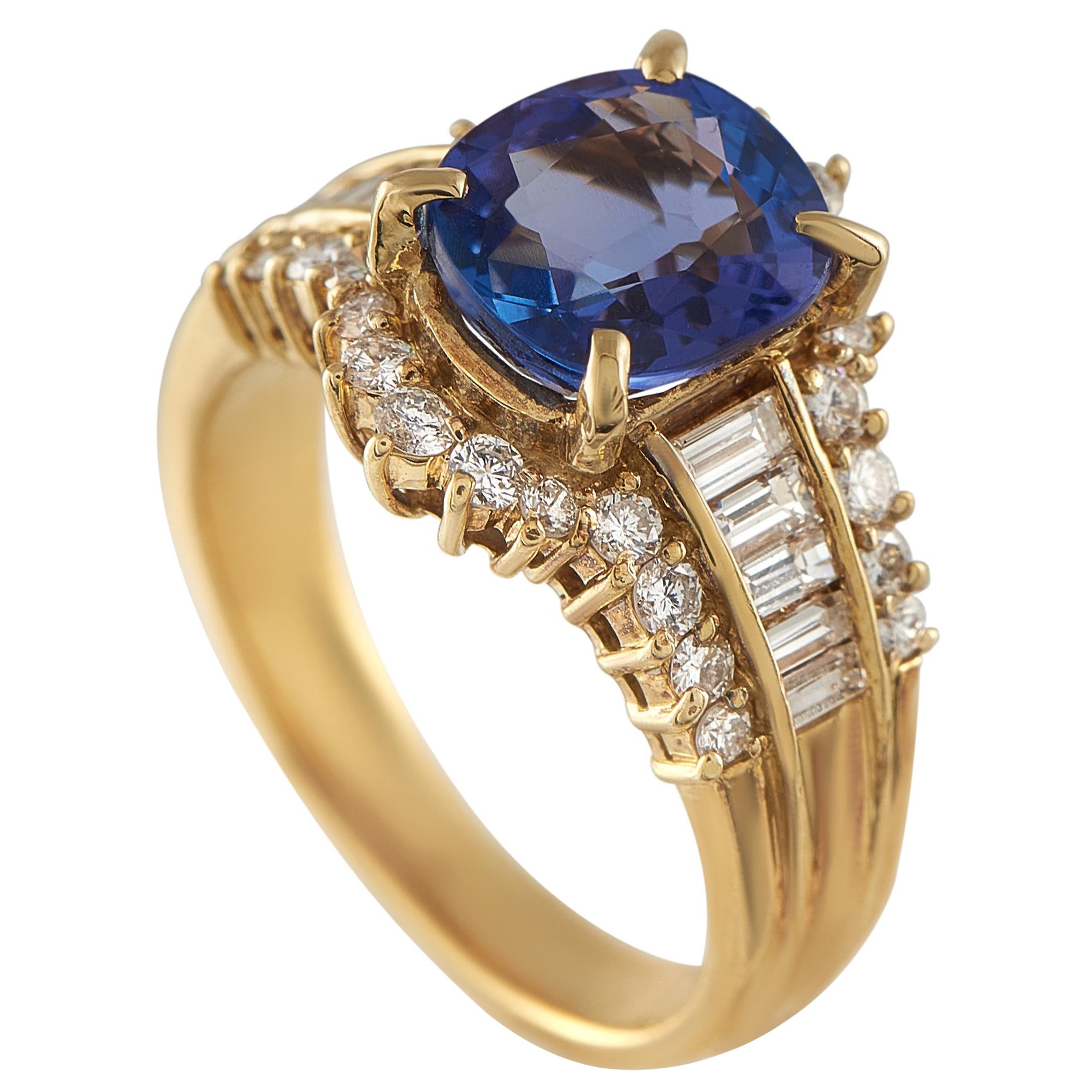 Bague en or jaune 18K avec diamant et tanzanite de 0,85ct en vente