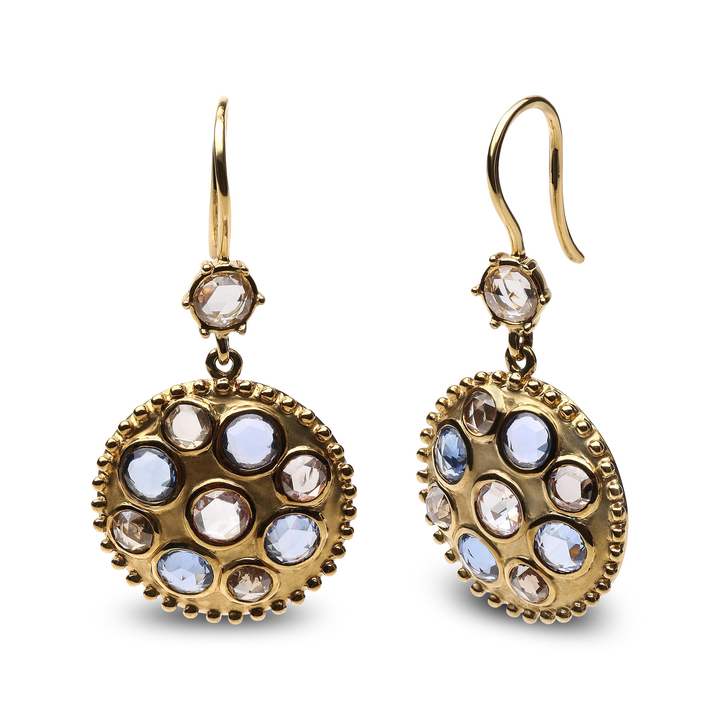 Colorful blue sapphires with brown and white diamonds combine to create a striking motif in these cluster medallion earrings made from genuine 18k yellow gold. The natural 3.5mm round heat-treated blue sapphires along with round white and