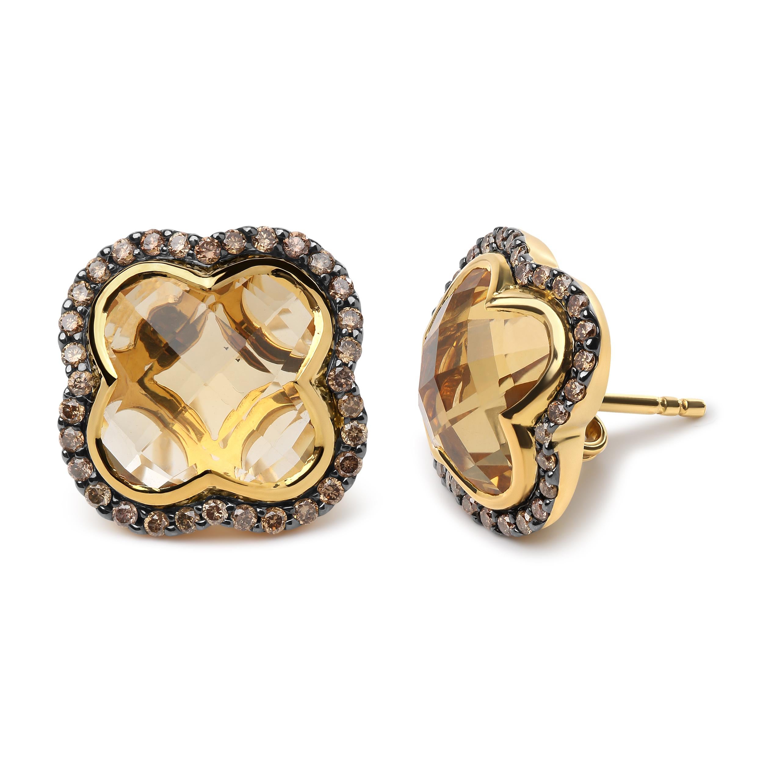 These whimsical yet sophisticated 18k yellow gold earrings will bring you good fortune with their lovely shimmer and dazzling elegance. A natural 11x11mm clover-cut yellow citrine gemstone sits prominently in an invisible setting that perfectly
