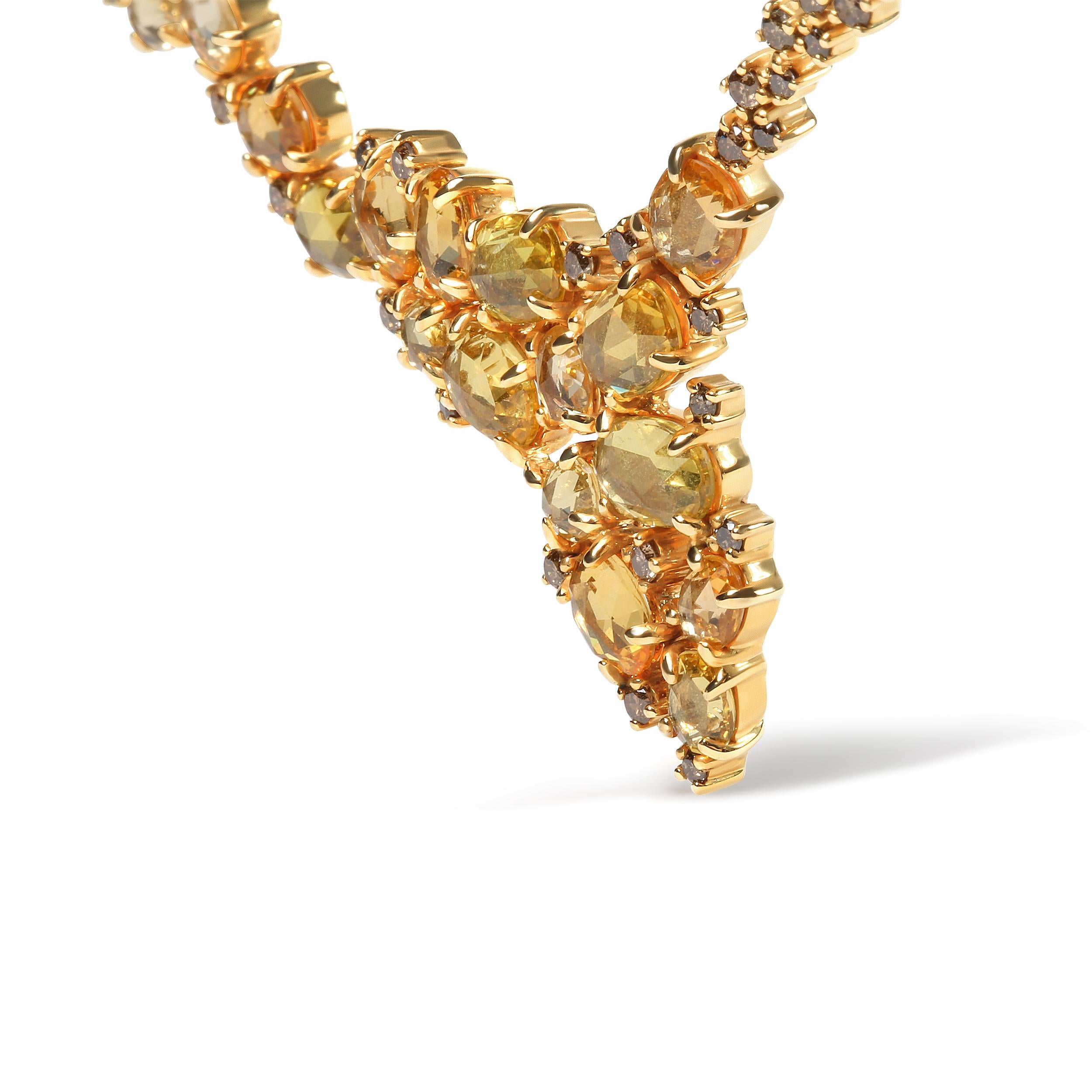 A perfect look for both day and night, this 18k yellow gold station necklace is illuminated by the sparkle of natural gemstones and diamonds in a clustered cascading waterfall design. A scattered arrangement of natural oval heat-treated yellow