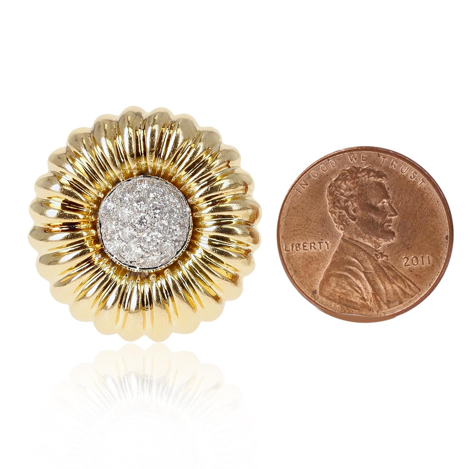 A pair of Floral Circular Clip-on Earrings with Diamonds made in 18 Karat Yellow Gold. The length and width of the earrings are 1 inch. The total weight is 27.57 grams. 
