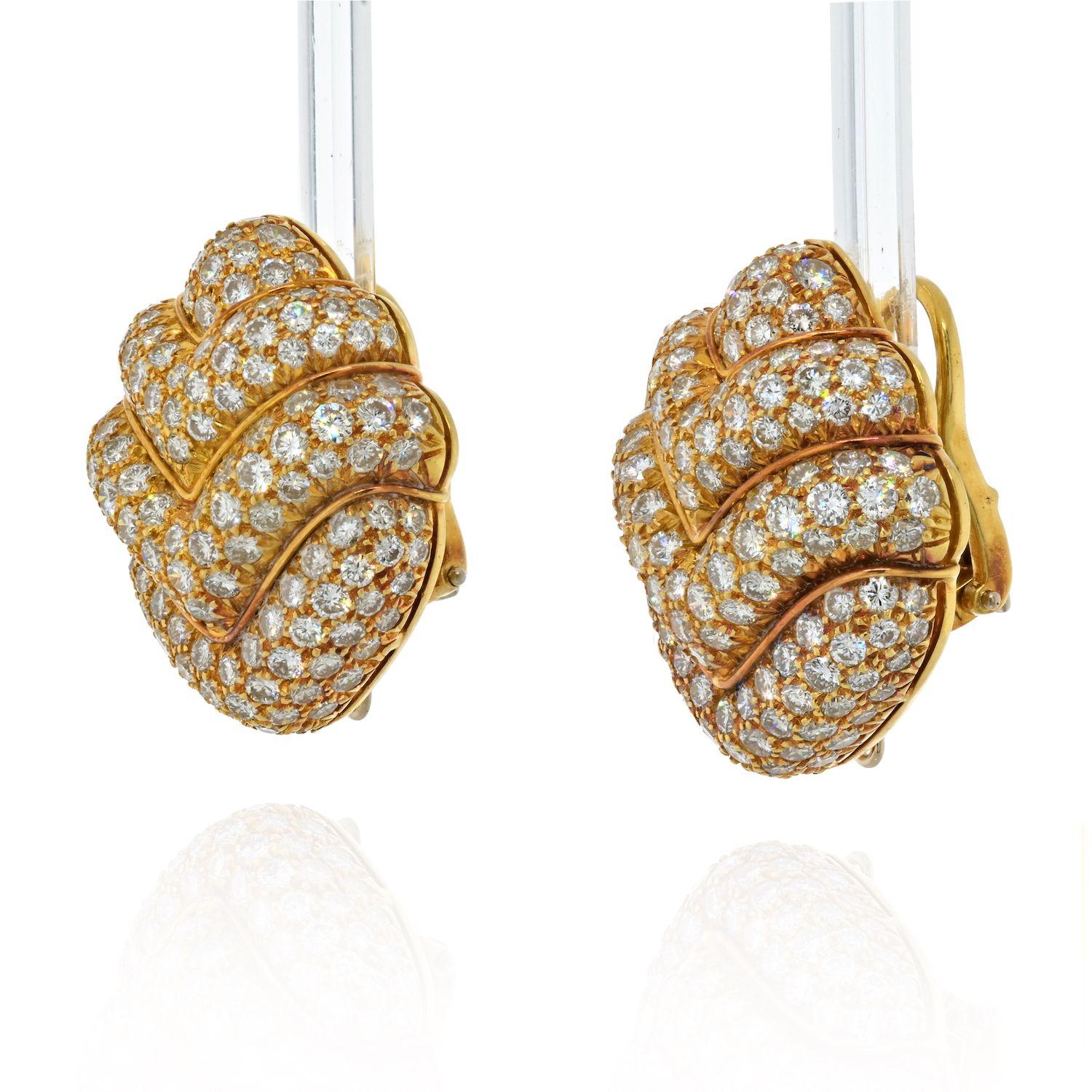 Designed in inverted pyramid layered fashion with lines of pave set diamond lines, set in 18k gold. With an option to hang on a bottom piece that can be something like pearl drop or a gemstone. 
Average diamond quality VS-SI. 
Earring length: