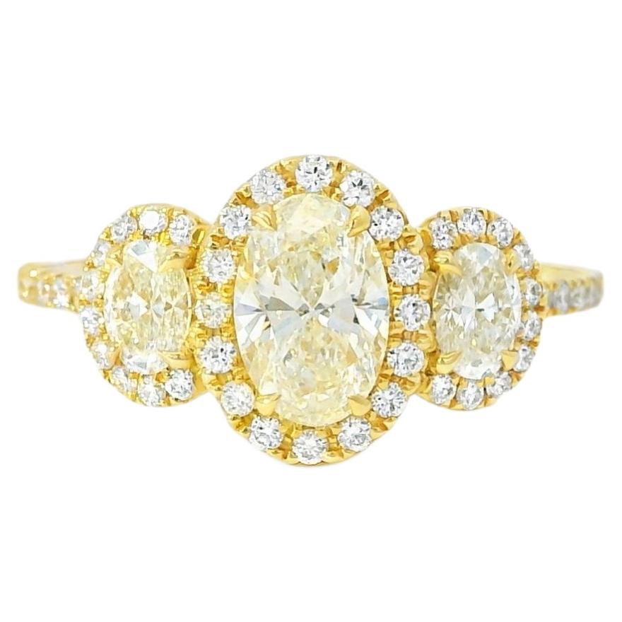 18k Yellow Gold 1.08ct Three-Stone Oval Diamond and 0.35ct Round Diamonds Ring